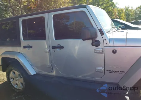 2011 Jeep Wrangler Unlimited Sahara из США, поврежденный, VIN 1J4HA5H1XBL632753